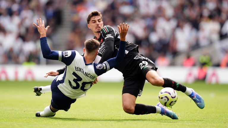 Arsenal's Kai Havertz and Tottenham Hotspur's Rodrigo Bentancur (left) compete for the ball.